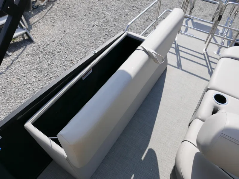 Slide: The Image of 2024 Starcraft SLS 3 Q DH boat interior with open storage compartment and seating. - 25