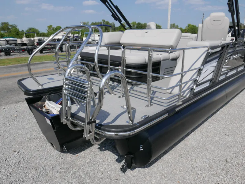 Slide: The Image of 2024 Starcraft SLS 3 Q DH pontoon boat with sleek design and comfortable seating. - 4