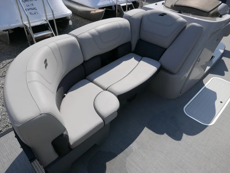 Slide: The Image of 2024 Starcraft SLS 3 Q DH boat interior with plush gray seating. - 9
