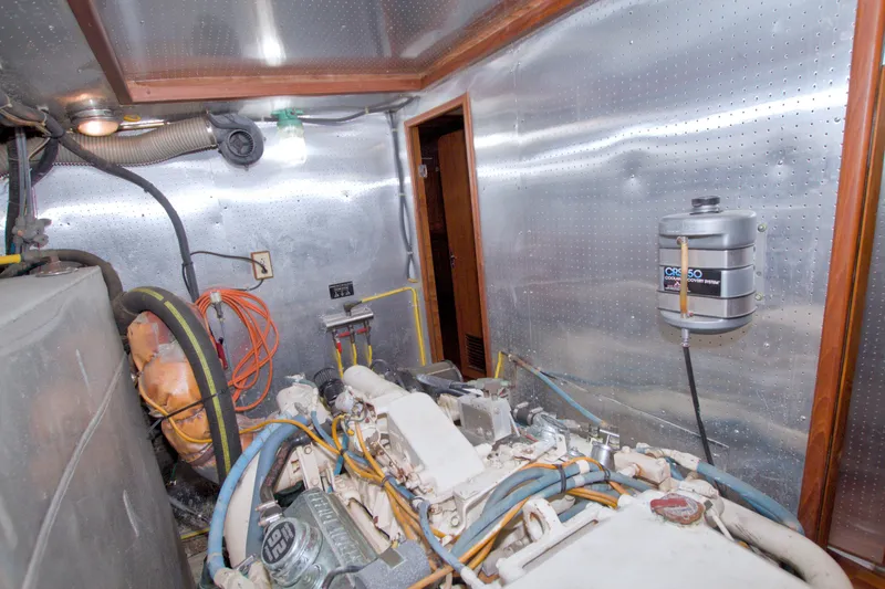 Slide: The Image of Engine room of 1994 Jefferson Marquessa 56 Extended Deckhouse yacht, featuring mechanical components. - 115