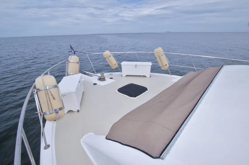 Slide: The Image of 1994 Jefferson Marquessa 56 yacht deck with ocean view and safety equipment. - 44