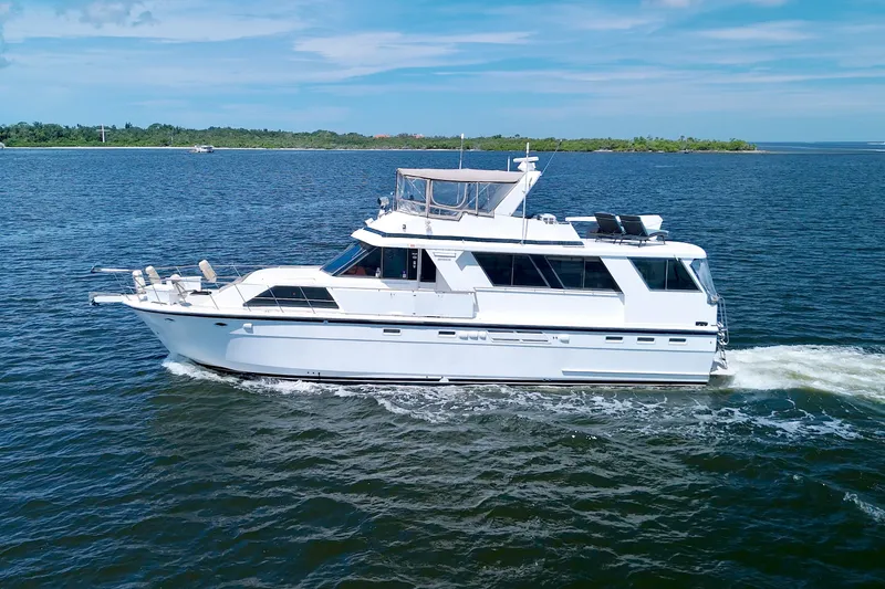 Slide: The Image of 1994 Jefferson Marquessa 56 yacht cruising on open water under a clear blue sky. - 9