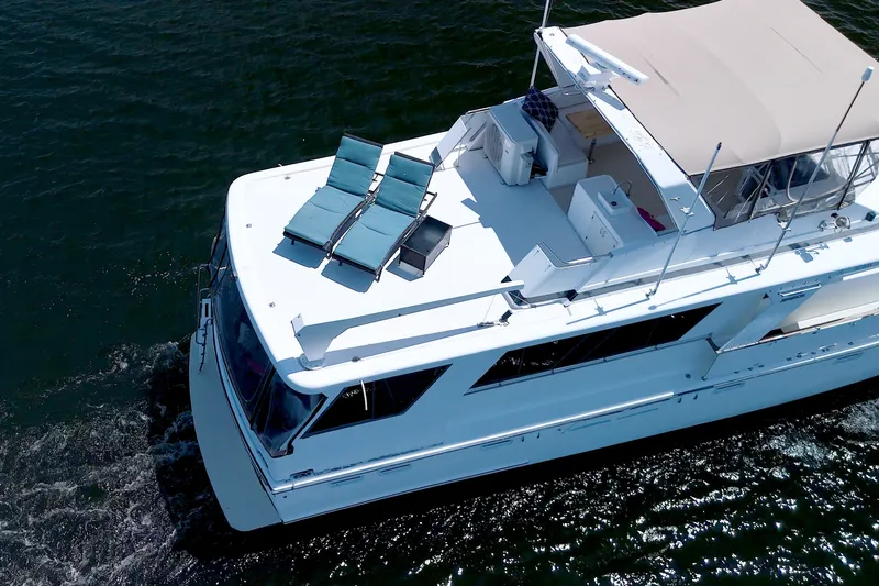 Slide: The Image of Aerial view of 1994 Jefferson Marquessa 56 yacht cruising on water. - 2