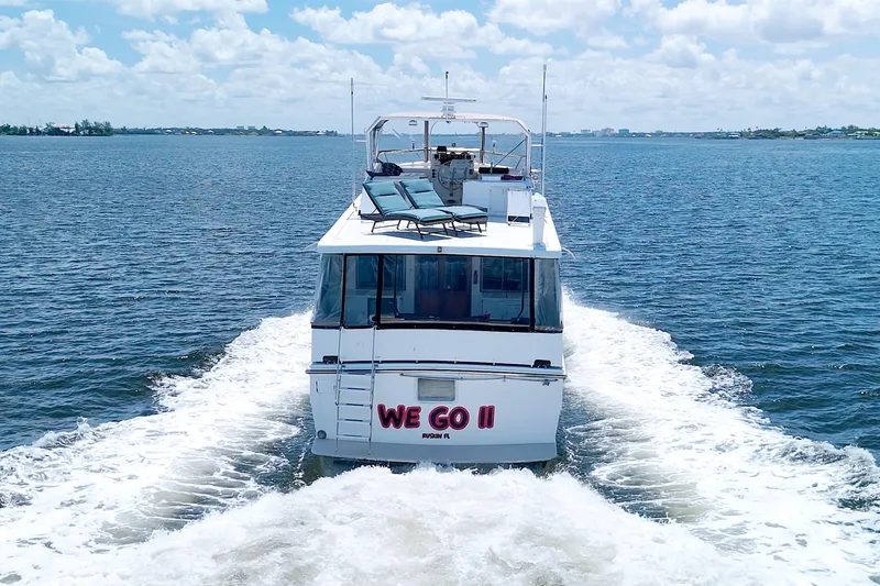 Slide: The Image of 1994 Jefferson Marquessa 56 yacht cruising on open water under a clear sky. - 4