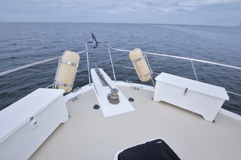 Slide: The Image of Bow view of 1994 Jefferson Marquessa 56 yacht on open water. - 45
