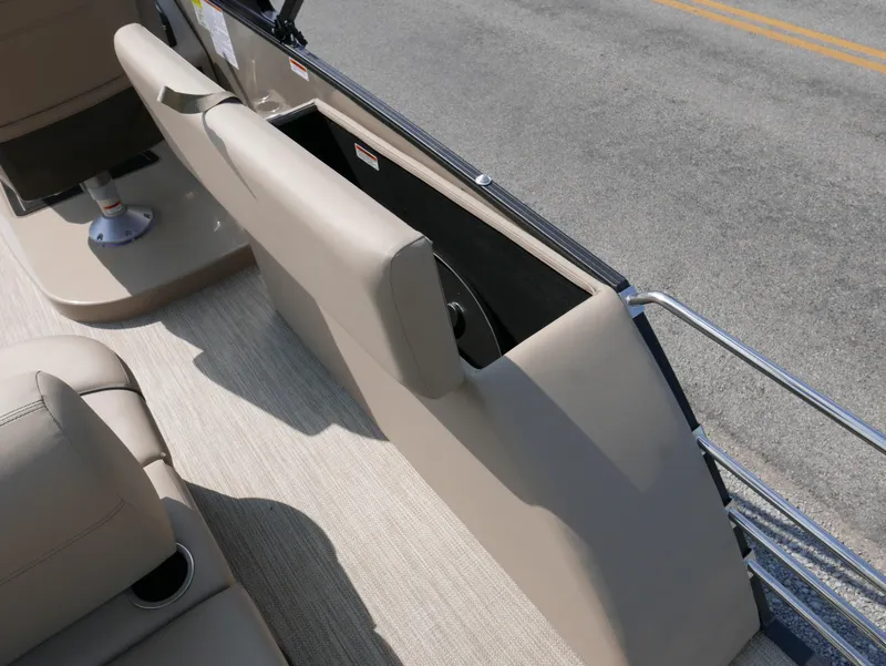 Slide: The Image of 2024 Starcraft SLS 3 Q DH boat interior with beige seating and storage compartment. - 15