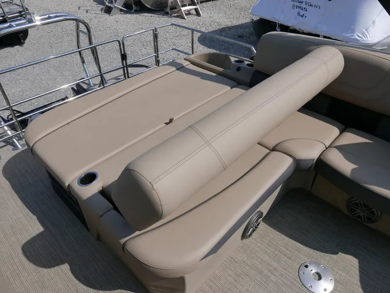 Slide: The Image of 2024 Starcraft SLS 3 Q DH boat with beige seating and cup holders. - 21