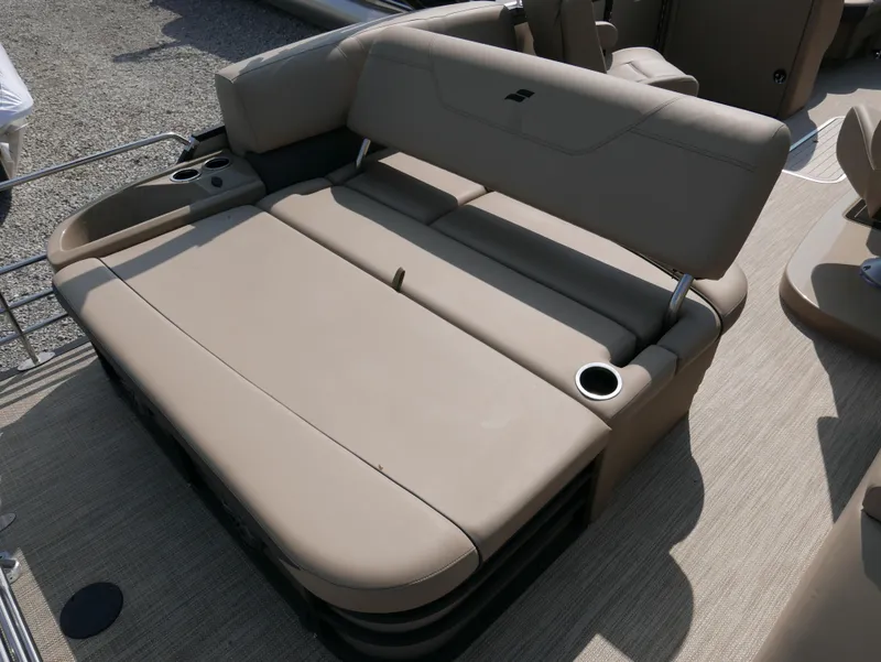 Slide: The Image of 2024 Starcraft SLS 3 Q DH boat seating with cup holders, beige upholstery. - 22