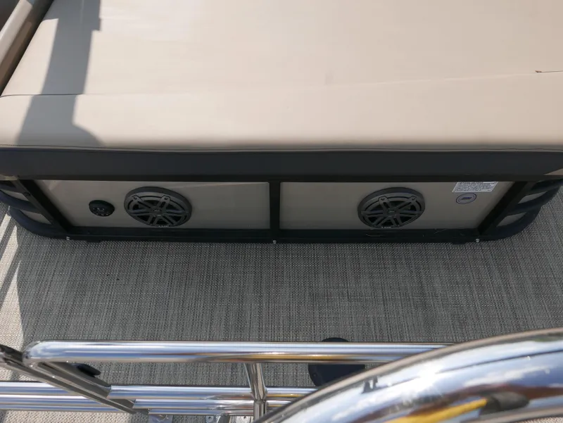 Slide: The Image of 2024 Starcraft SLS 3 Q DH boat interior with speakers and cushioned seating. - 25