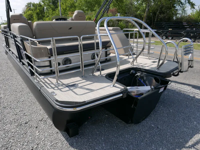 Slide: The Image of 2024 Starcraft SLS 3 Q DH pontoon boat with sleek design and spacious seating. - 4