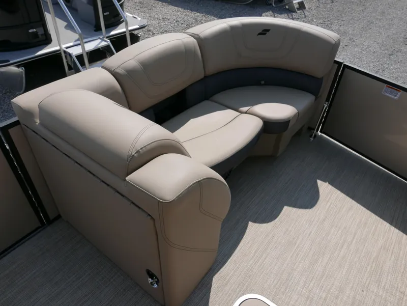 Slide: The Image of Luxurious seating on 2024 Starcraft SLS 3 Q DH pontoon boat, featuring beige upholstery. - 7