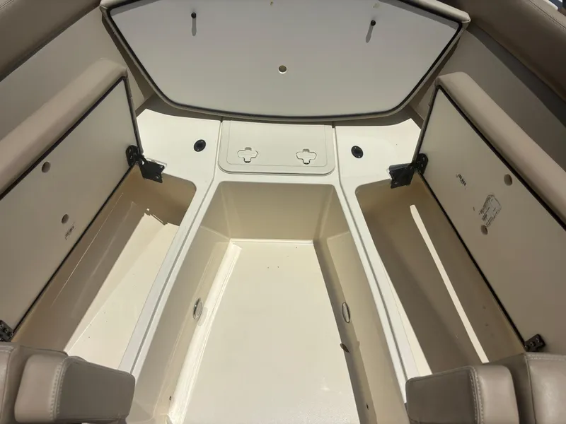 Slide: The Image of 2024 Scout 240 Dorado boat interior storage compartments. - 21