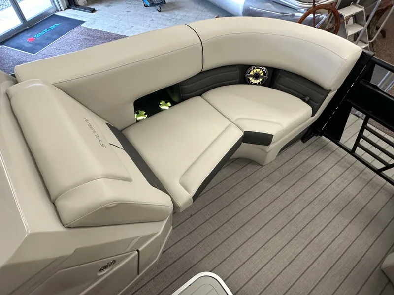 Slide: The Image of 2024 Sylvan G3 CLZ DC boat interior with plush seating and modern design. - 10