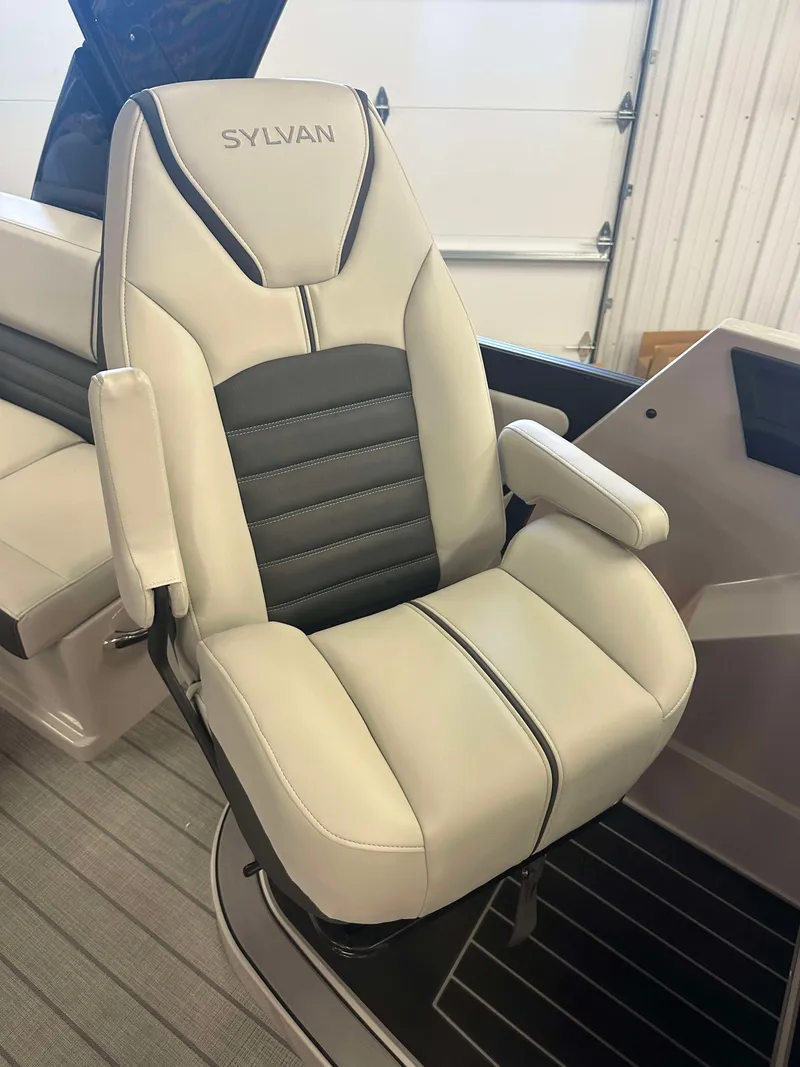Slide: The Image of 2024 Sylvan G3 CLZ DC boat seat with armrests in a modern interior. - 21