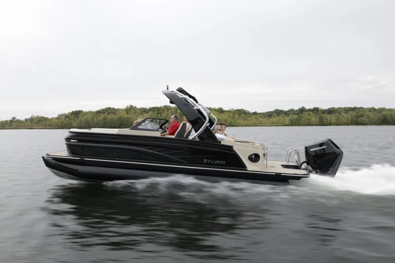 Slide: The Image of 2024 Sylvan G3 CLZ DC boat cruising on a lake. - 29