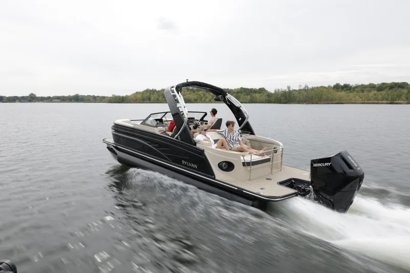 Slide: The Image of 2024 Sylvan G3 CLZ DC boat cruising on a lake with passengers. - 32
