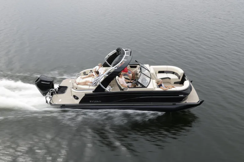 Slide: The Image of 2024 Sylvan G3 CLZ DC boat cruising on a lake with passengers. - 34