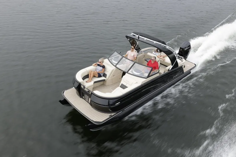 Slide: The Image of 2024 Sylvan G3 CLZ DC boat cruising on water with passengers. - 36