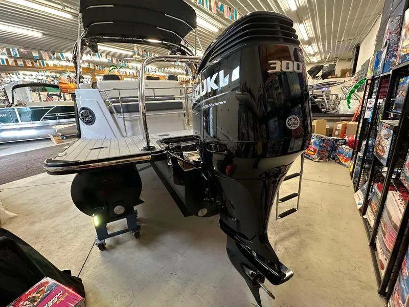 Slide: The Image of 2024 Sylvan G3 CLZ DC boat with Suzuki 300 outboard motor in showroom. - 7