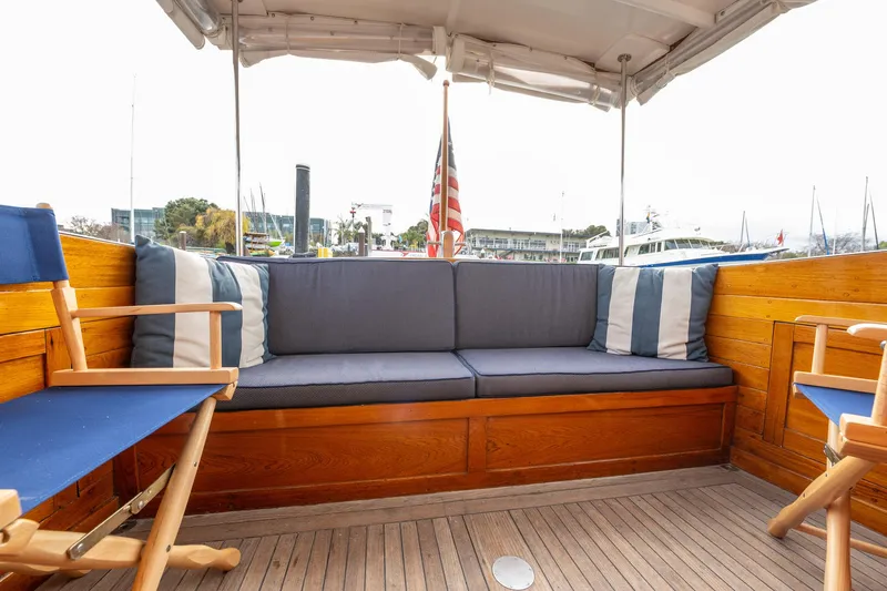 Slide: The Image of 1939 Stephens Brothers Bridgedeck Cruiser interior with wooden seating and nautical decor. - 39