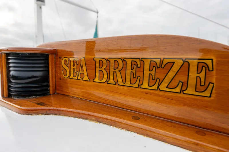 Slide: The Image of Wooden nameplate "Sea Breeze" on 1939 Stephens Brothers Bridgedeck Cruiser. - 48