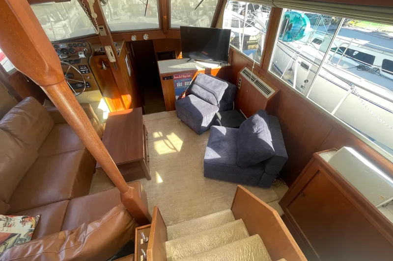 Slide: The Image of Interior of a 1975 Uniflite Aft Cabin with beds and mirror. - 26