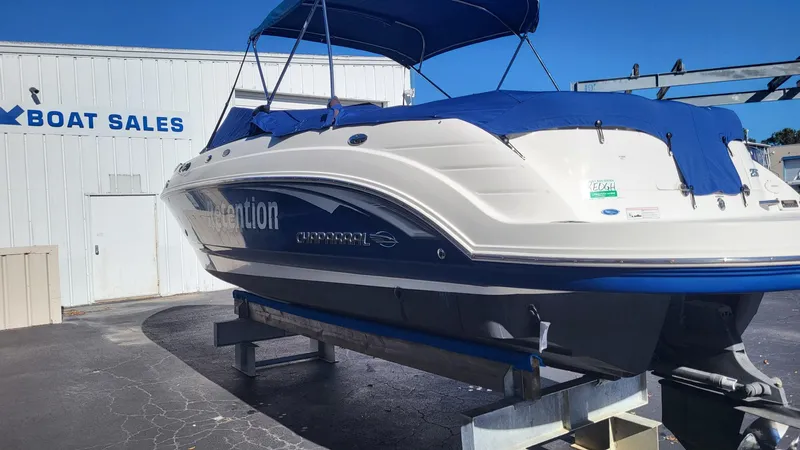Slide: The Image of 2007 Chaparral 256 SSi boat on display at a boat sales dealership. - 3