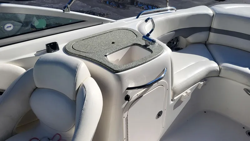 Slide: The Image of 2007 Chaparral 256 SSi boat interior with seating and sink. - 6
