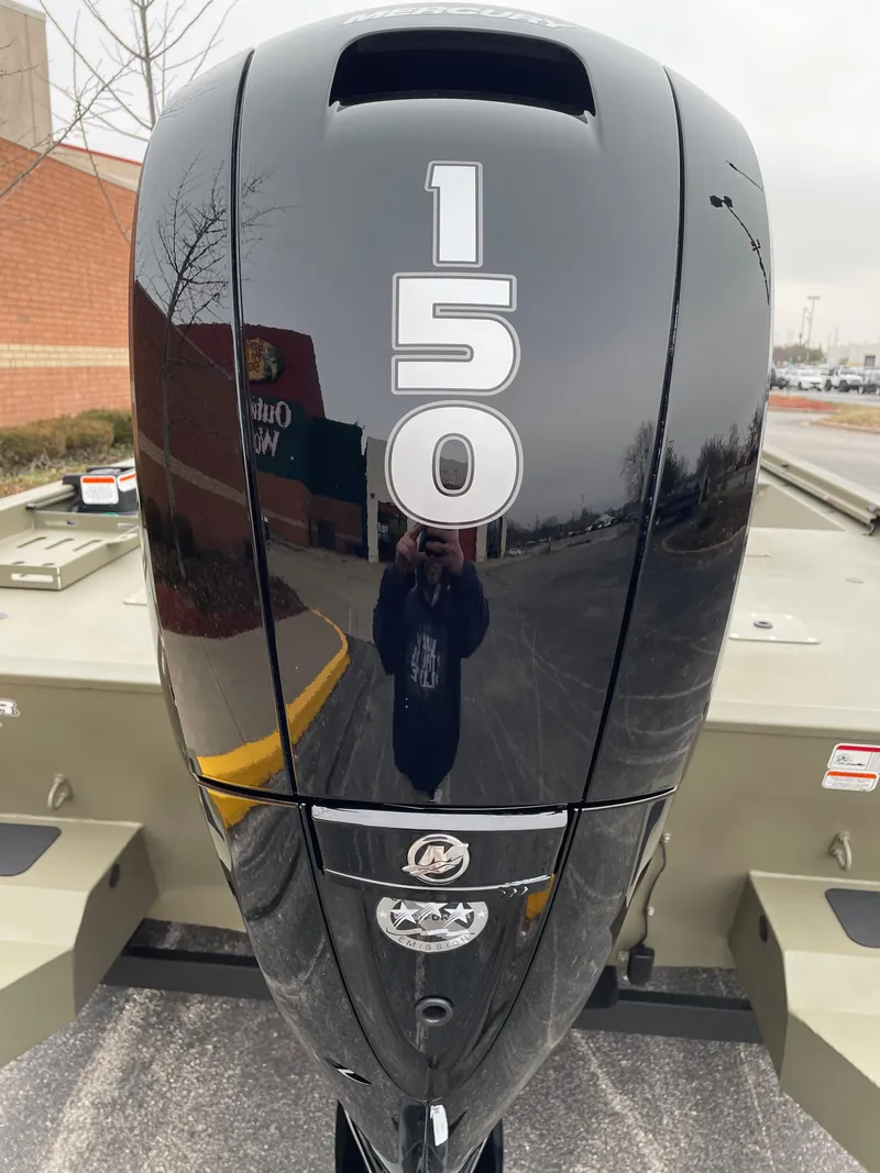 Slide: The Image of 2024 Tracker Grizzly 2072 CC Sportsman with 150 HP Mercury outboard motor. - 3