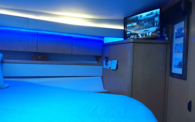 Slide: The Image of Interior cabin of a 1996 Tiara Yachts 4300 Open with modern amenities. - 13