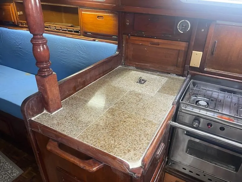 Slide: The Image of 1981 Allied Mistress Mk III boat interior with kitchen counter and stove. - 7