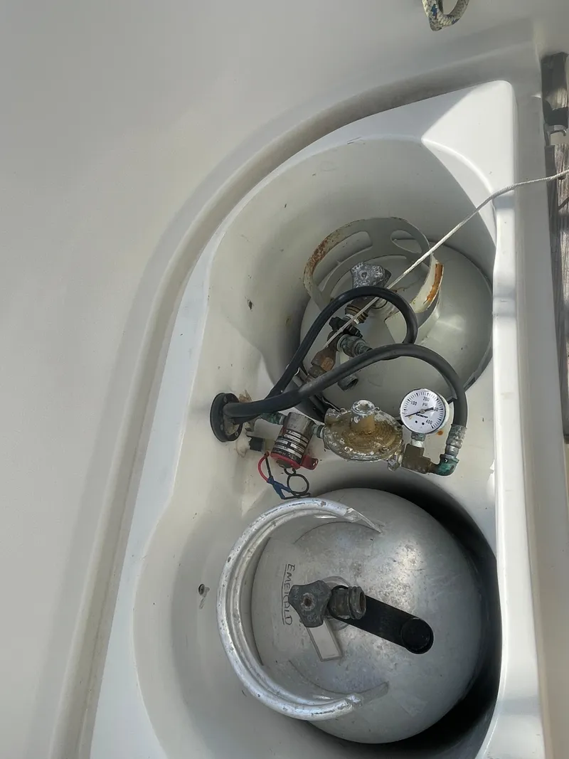 Slide: The Image of Propane tank storage compartment on a 1995 Passport 47 AC Plan B sailboat. - 17