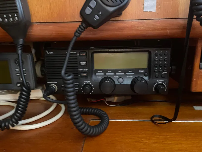 Slide: The Image of 1995 Passport 47 AC Plan B radio communication equipment on wooden panel - 18