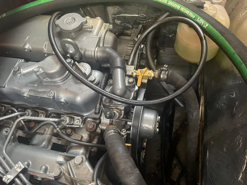 Slide: The Image of Close-up of a 1995 Passport 47 AC Plan B engine compartment. - 27