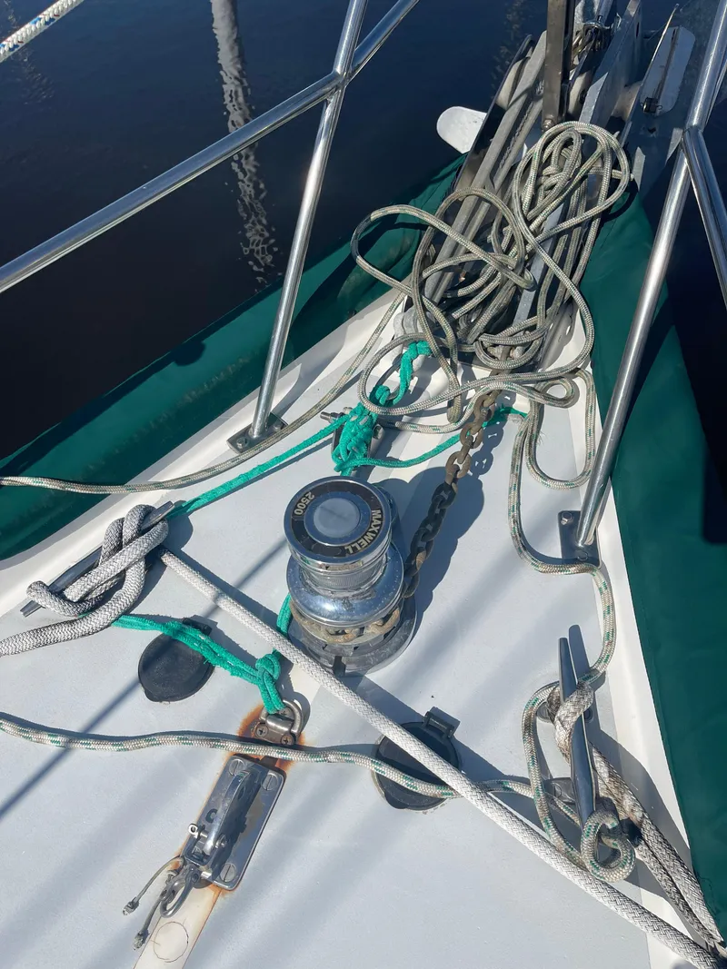 Slide: The Image of Deck of 1995 Passport 47 AC Plan B sailboat with winch and ropes. - 3