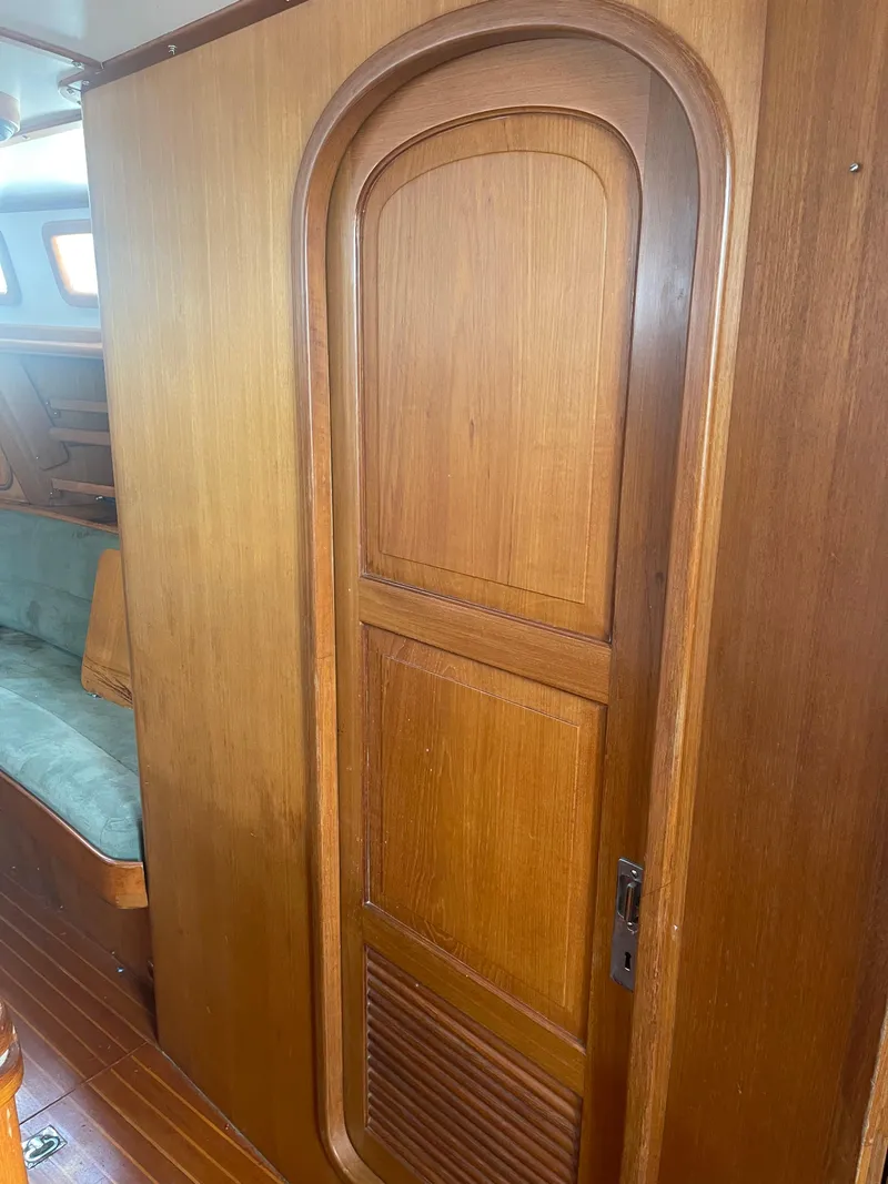 Slide: The Image of Wooden interior door on a 1995 Passport 47 AC Plan B sailboat. - 33