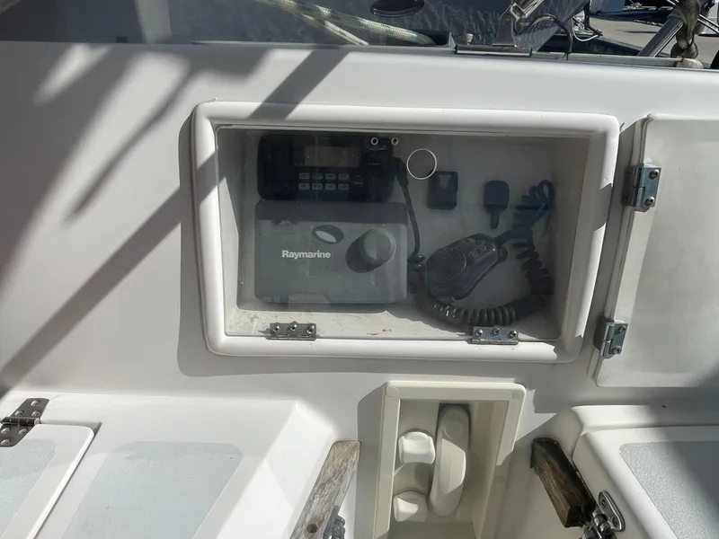 Slide: The Image of Boat cockpit electronics compartment on a 1995 Passport 47 AC Plan B. - 37