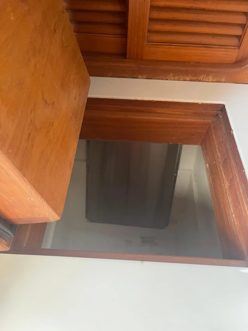 Slide: The Image of Wooden hatch opening on Passport 47 AC Plan B, 1995 model. - 38