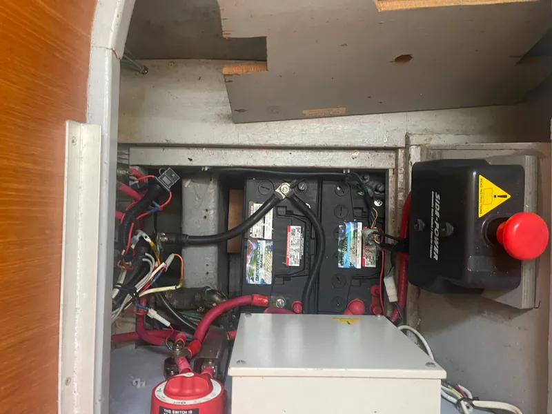 Slide: The Image of Battery compartment of a 1995 Passport 47 AC Plan B sailboat. - 42