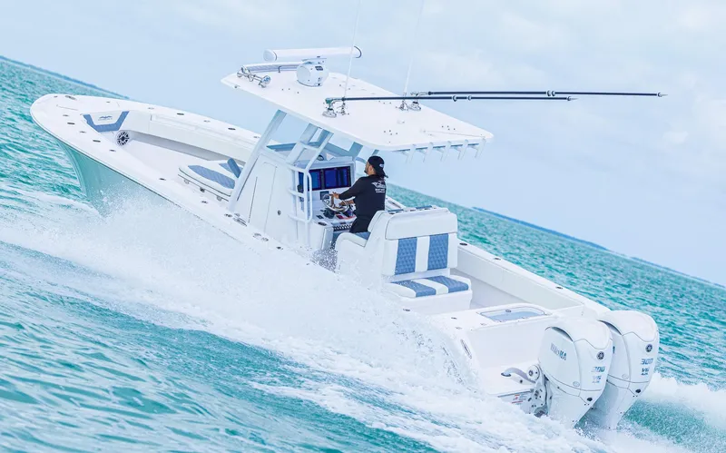 Slide: The Image of 2024 Invincible 33 Open Fisherman boat cruising on the ocean. - 19