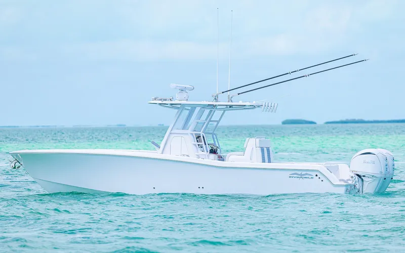 Slide: The Image of 2024 Invincible 33 Open Fisherman boat on the water. - 23