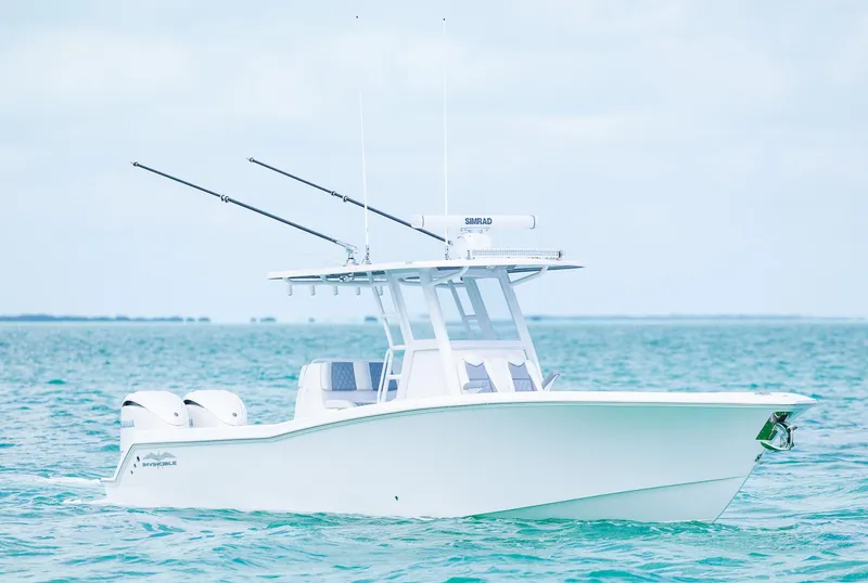 Slide: The Image of 2024 Invincible 33 Open Fisherman boat on the water. - 26