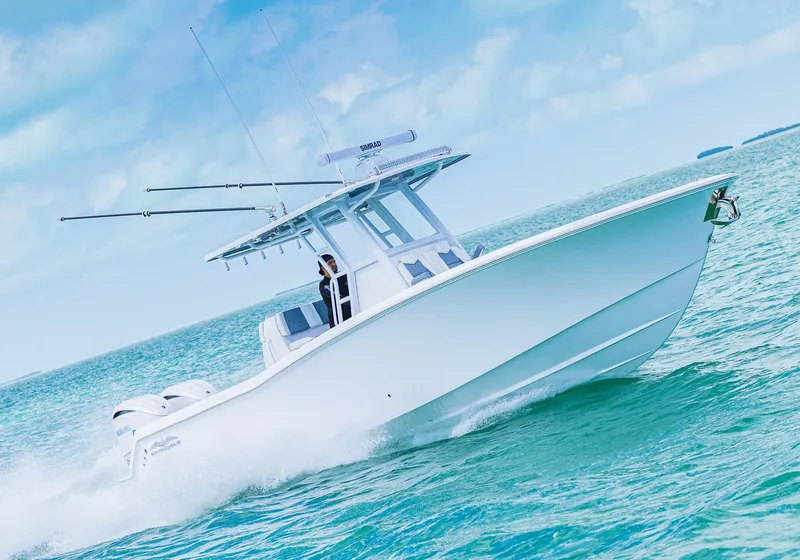 Slide: The Image of 2024 Invincible 33 Open Fisherman boat cruising on the ocean. - 3