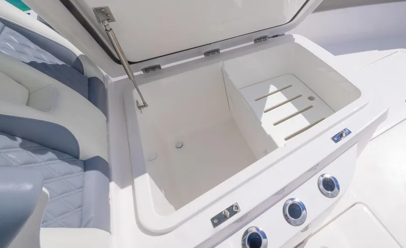 Slide: The Image of 2024 Invincible 33 Open Fisherman boat storage compartment. - 33