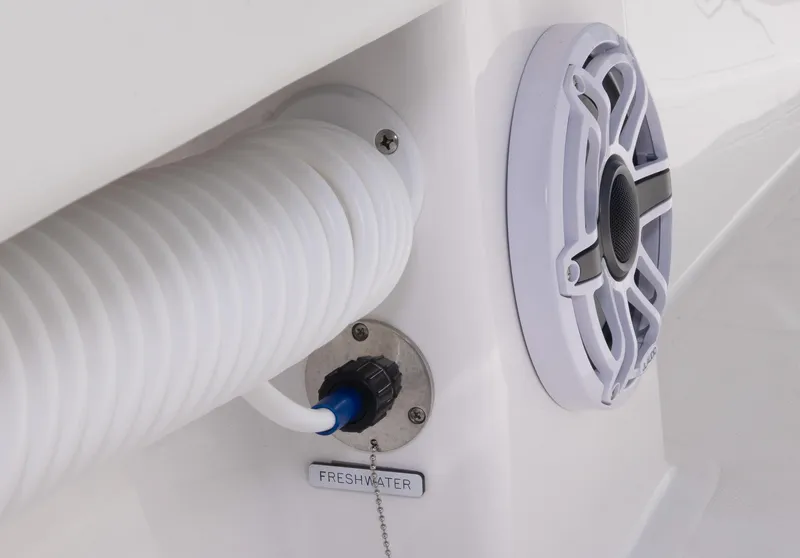 Slide: The Image of Close-up of freshwater hose and speaker on 2024 Invincible 33 Open Fisherman boat. - 43