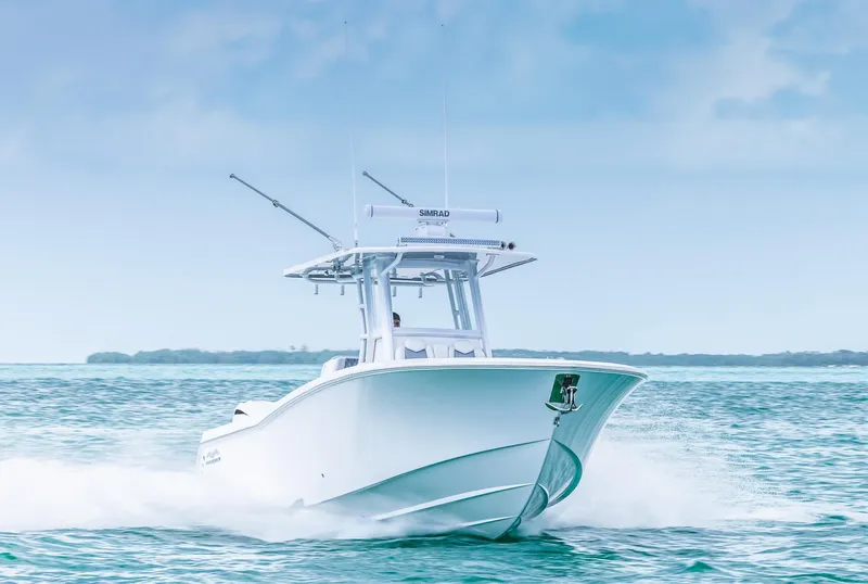 Slide: The Image of 2024 Invincible 33 Open Fisherman boat cruising on the water. - 8