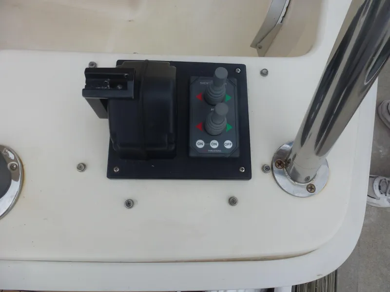 Slide: The Image of Control panel of a 2005 Mainship 34 Trawler boat. - 15