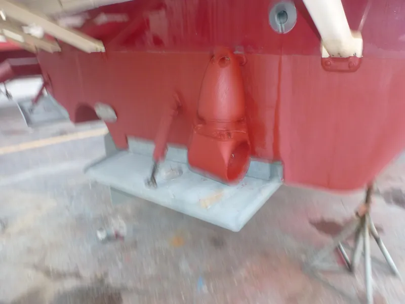 Slide: The Image of Close-up of the stern of a 2005 Mainship 34 Trawler boat. - 34