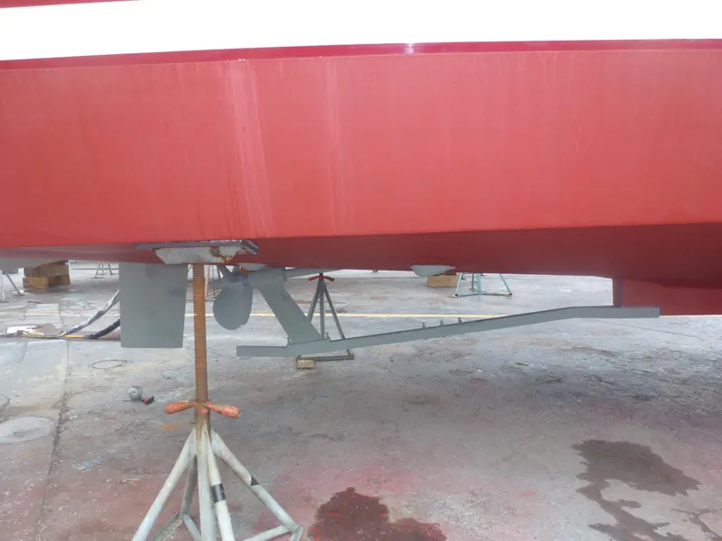 Slide: The Image of 2005 Mainship 34 Trawler hull and propeller on dry dock. - 36