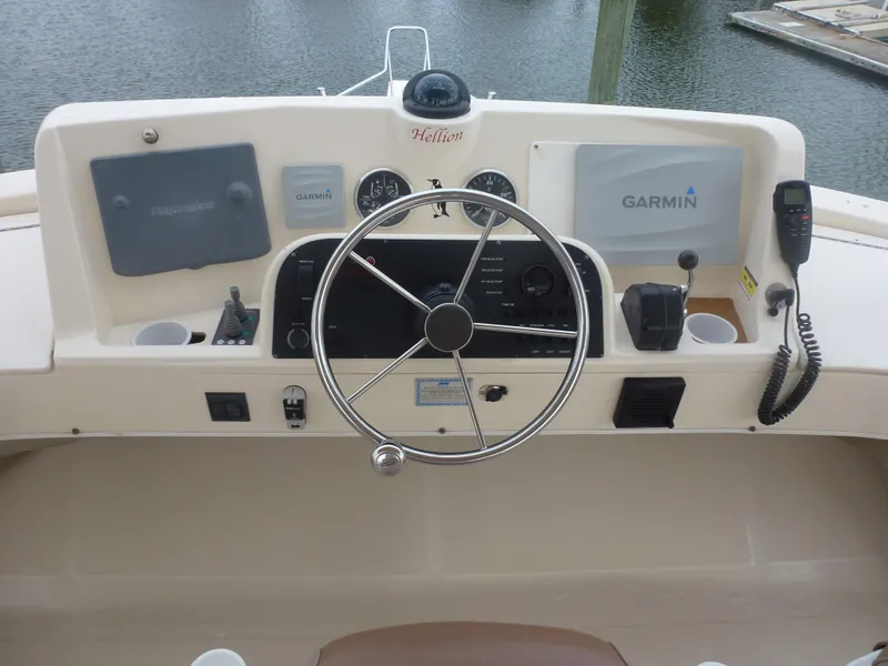 Slide: The Image of Mainship 34 Trawler 2005 helm with Garmin navigation and communication equipment. - 9